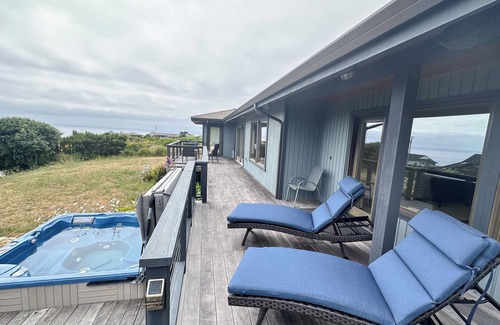 Manchester House | Beautiful single story home with lighthouse and panoramic ocean views.