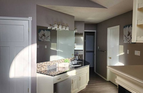 Springbank House | Beautiful, Spacious & Serene Home in Springbank Estates!