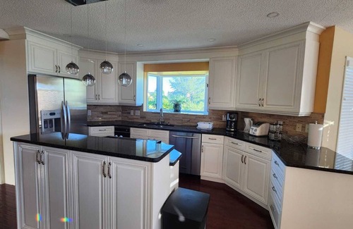 Springbank House | Beautiful, Spacious & Serene Home in Springbank Estates!