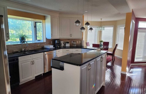 Springbank House | Beautiful, Spacious & Serene Home in Springbank Estates!