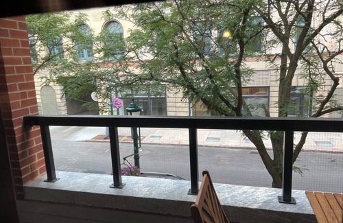 Downtown Syracuse Apartment | Beautiful Suite with Balcony overlooking Warren St in Syracuse
