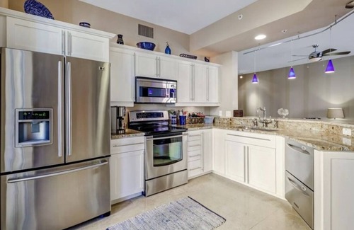 Redevelopment Area Condo | Beautiful Three-Balcony Unit - With Bayviews. Walk to 5th Ave DT and The Beach!