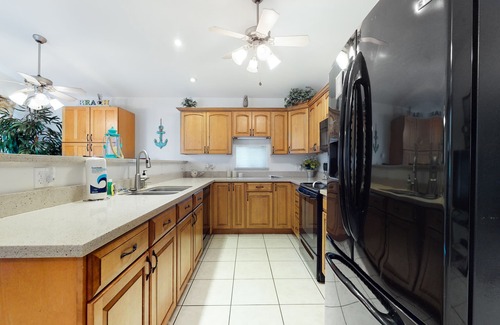 Port Isabel House | Beautiful waterfront home w/private dock, shared pool/hot tub - 1 dog OK