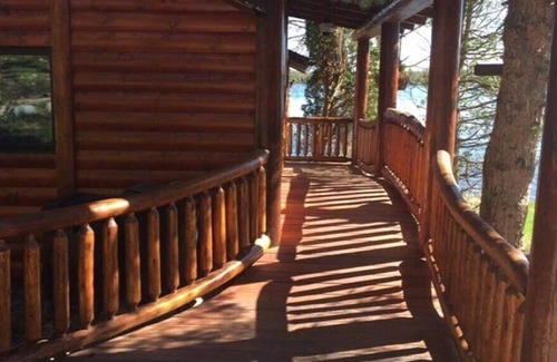 Lake Tomahawk House | Beautiful wet boathouse on Lake Tomahawk