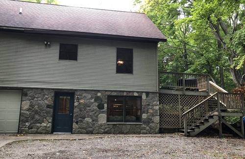 Elmira Cottage | Beautiful wooded setting in Lakes of the North!
