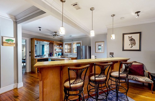Westside House | Beautifully updated home with enclosed yard, W/D, and central AC
