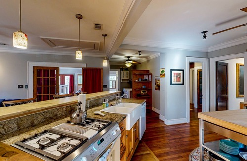 Westside House | Beautifully updated home with enclosed yard, W/D, and central AC