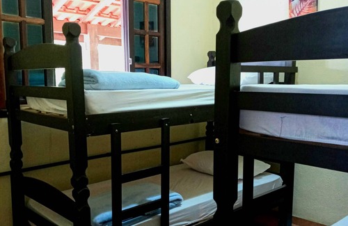 Itamambuca Cabin | Bed in shared room