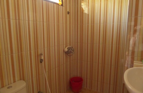 Tengger Caldera Bed & Breakfast | Bedroom for 4 person view direct to Mt. Bromo