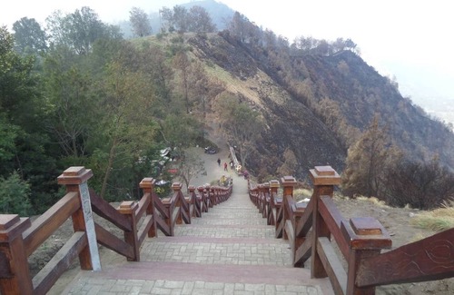 Tengger Caldera Bed & Breakfast | Bedroom for 4 person view direct to Mt. Bromo