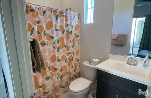 Chandler Apartment | Bedroom with attached bathroom with private entrance