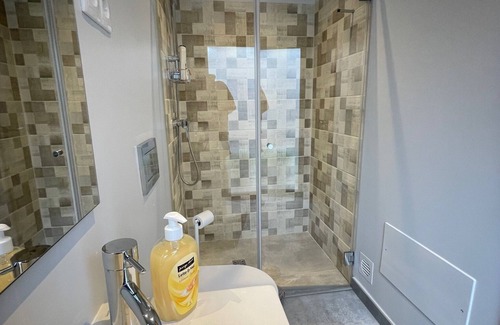 Salema Cabin | Bedroom with private bathroom close to fisherman's trail