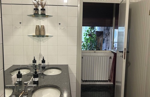 Busto Garolfo House | Beds in shared room