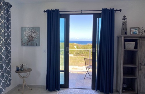 Jobos House | Bella Dunes - Luxury Oceanfront Home, Steps from Jobos Beach