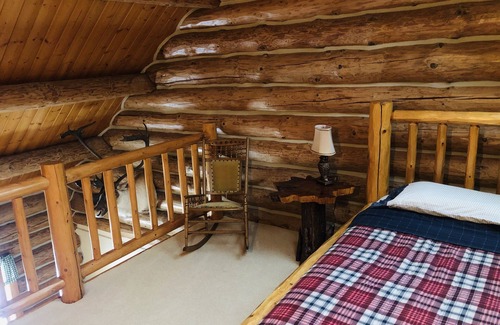 Central Lake Cabin | Bellaire Overlook Log Home on Beautiful 40 Acres with sunset views