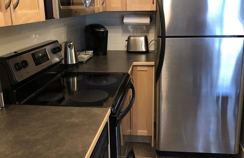 Canmore Condo | Best Relaxing King Bed Suite/Mtn. View, Heated Pool & Hot Tubs