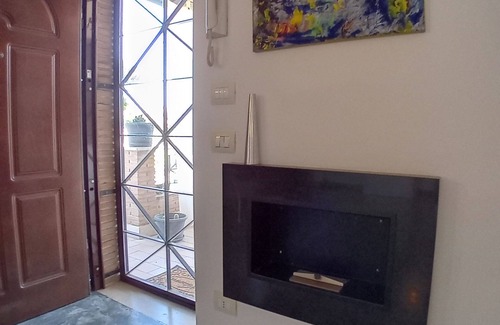 Zona XXX Castel Fusano Apartment | BIBI HOUSE surrounded by greenery