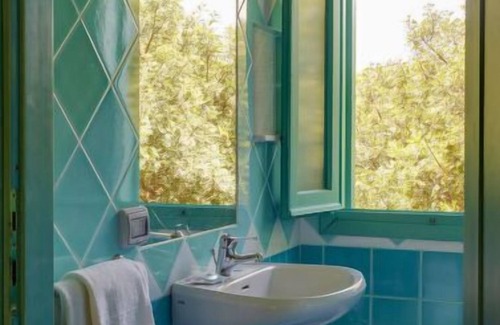 Tiriddo Apartment | Bilo 4 - Lu Nibareddu by Interhome
