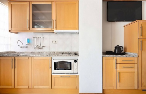 Areias de Sao Joao Hotel | Blissful Getaway! Full Kitchen and Balcony, Swimming Pool, Near Oura Beach!