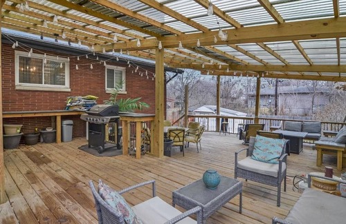 Miller Beach Apartment | Blocks from the beach with giant covered deck, firepit, and grill!