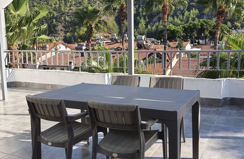 Fethiye Apartment | Bluberry Central Fethiye's apartments with Amyntas Rock Tombs view.
