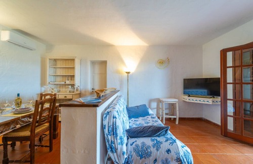 Capo Coda Cavallo Apartment | Blue Dawn: Panoramic Apartment Just Steps from the Sea