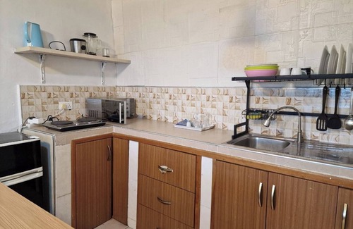 Dansoman House | Blueberry suite 1 with a minimalist touch to make you feel @ home.