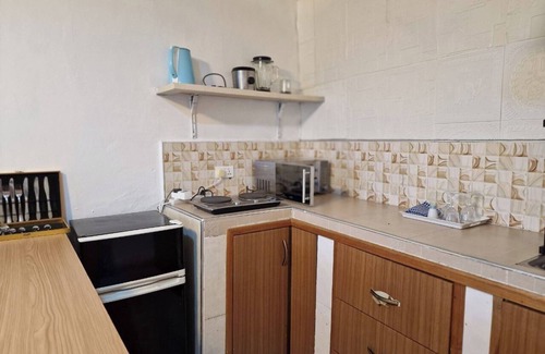 Dansoman House | Blueberry suite 1 with a minimalist touch to make you feel @ home.