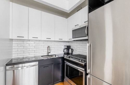 Financial District Apartment | Blueground | Financial District, rooftop, nr Wall St