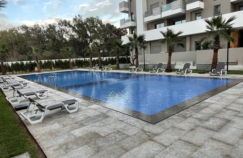 Casablanca Apartment | Boasting accommodation with a pool view and a balcony,