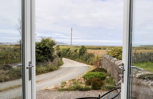 Holyhead Cottage | BODLASAN GROES COTTAGE, pet friendly, with a garden in Llanfachraeth