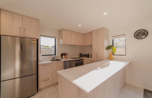Upper Riccarton House | Bohemian Bliss in Mohua Lane: Your 4BR Haven