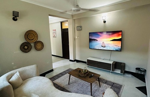 Dar es Salaam Apartment | Bold and Beautiful 1-bedroom apartment with WiFi, AC Mikocheni Dar es Salaam