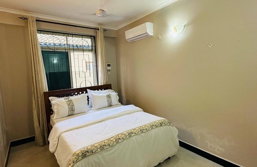 Dar es Salaam Apartment | Bold and Beautiful 1-bedroom apartment with WiFi, AC Mikocheni Dar es Salaam
