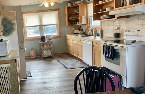 Carova Beach House | Book NOW! Dog friendly, partial Ocean View, 4x4 Area, Cozy Beach cottage .