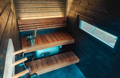 Muonio House | Borealis Village 10 with a Nature View, Fireplace, Sauna, Kitchen