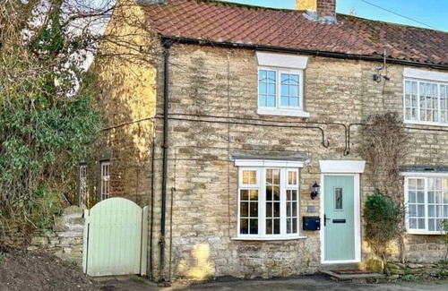 Welburn Cottage | Boutique luxury countryside cottage with hot tub, log burner, 4 poster & firepit