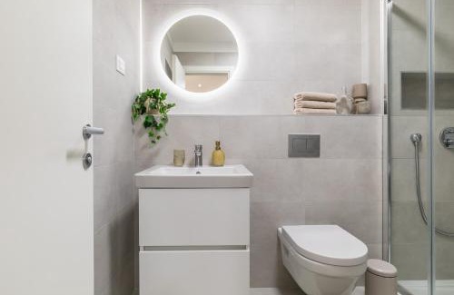 Vranjic Apartment | Boutique Soft Tones with Balcony and Secured Garage