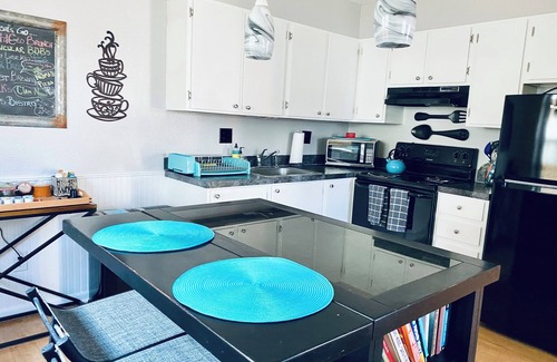 University Park Apartment | Boutique Studio Apartment Hotel across from CSU in Old Town Fort Collins! Like it's namesake, Studio FoCo (short for Fort Collins) is the perfect blend of special-occasion luxury and at-home comfort. Large windows overlook the tree-lined street of th