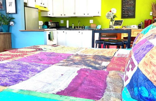 University Park Apartment | Boutique Studio Apartment Hotel across from CSU in Old Town Fort Collins!Take a trip back in time to when Hippies, Coffee Houses, and The British Invasion were everywhere! It's an urban-industrial studio, a rustic garden suite, and our pet-friendly c