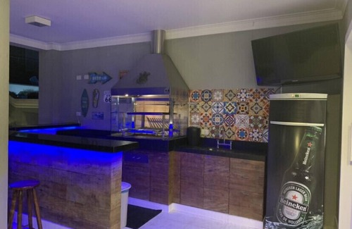 Pereque House | House with heated pool, barbecue, sauna, pool table, gated community, wifi, pets allowed!