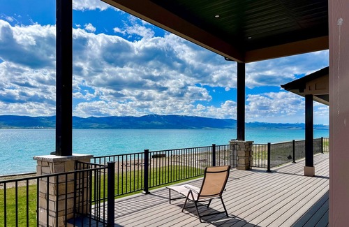 Laketown House | Brand-new lakefront home with private beach, mountain views, fireplace & deck