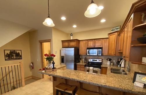 East Kootenay Condo | Breathtaking Mountain Views and Hot Tub Serenity Await