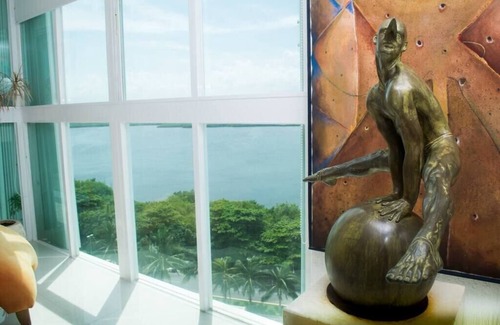 Zona Hotelera Condo | breathtaking studio, w/ocean and lagoon views, amazing wrap around balcony,.