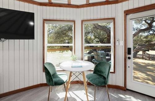 Dripping Springs Cabin | Breathtaking Treehouse Yurt! King Bed and Spa!
