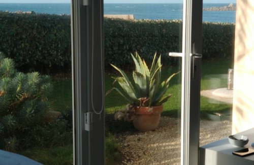 Cleder Apartment | Breathtaking view for this beautiful waterfront apartment.