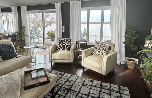 Elkton House | Breathtaking waterfront property with pool, private dock and open floor plan.
