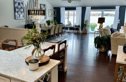 Elkton House | Breathtaking waterfront property with pool, private dock and open floor plan.