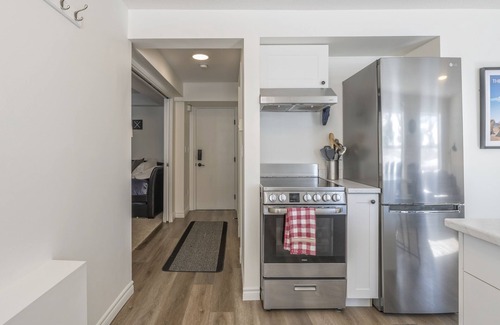 Silver Star Mountain Apartment | Bright 1 Bedroom Plus Private Den - modern suite with BBQ, pet friendly!