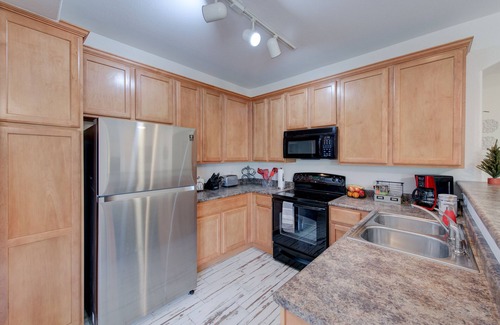 Aurora Condo | Bright and Beautiful Main Floor Condo